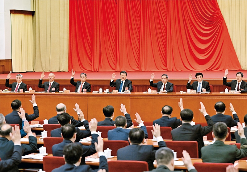 中國共產(chǎn)黨第二十屆中央委員會第二次全體會議，于2023年2月26日至28日在北京舉行。這是習(xí)近平、李強(qiáng)、趙樂際、王滬寧、蔡奇、丁薛祥、李希等在主席臺上。 新華社記者 謝環(huán)馳/攝
