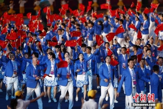 資料圖：9月23日，杭州第19屆亞運會開幕式舉行。中國代表團身著星辰藍(lán)禮服驚艷亮相。<a target='_blank' href='/'><p align=